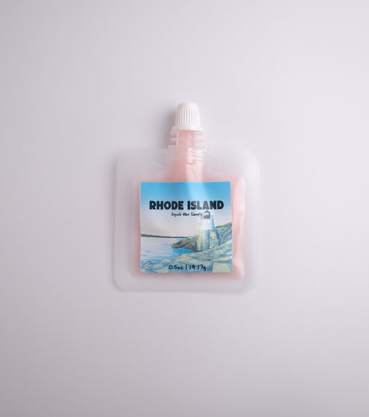 Small sample squish wax pouch with 'Rhode Island' label on a light gray background