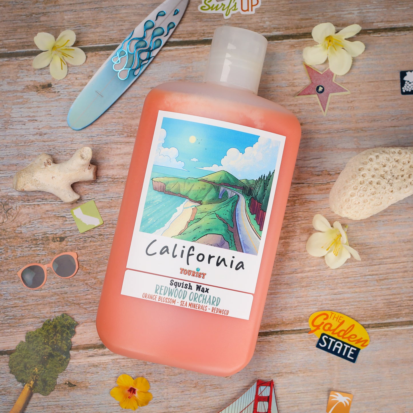 California Squish Wax in Redwood Orchard scent, orange color, features sea minerals and orange blossom.