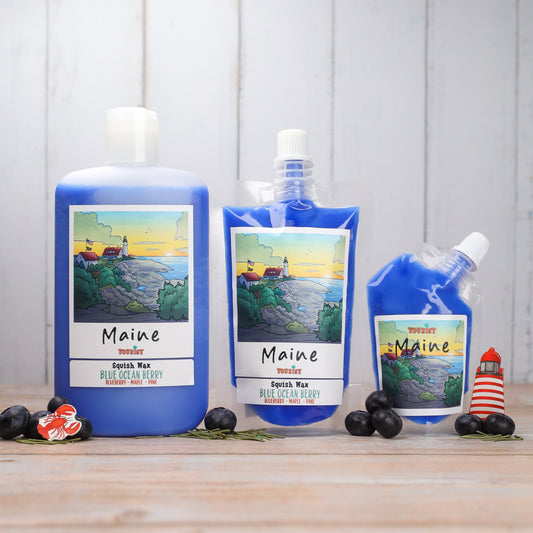 Three blue Squish Wax containers featuring Maine Blue Ocean Berry scent with blueberry, maple, and pine.