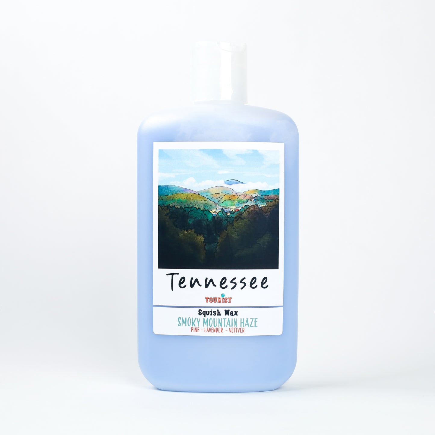 Tennessee Smoky Mountain Haze Squish Wax in blue bottle with pine, lavender, and vetiver scent.