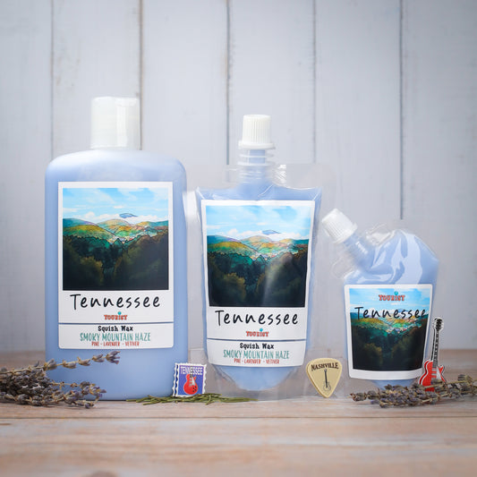 Three bottles of Tennessee Squish Wax, Smoky Mountain Haze scent, featuring lavender, pine, and vetiver notes.