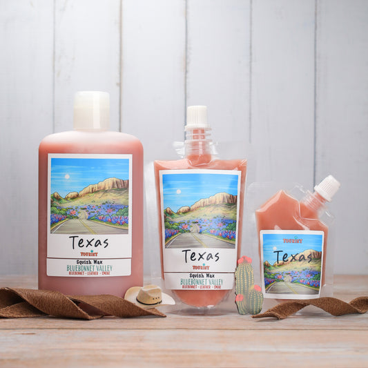 Texas Squish Wax in Bluebonnet Valley scent, featuring large and small pouches and a bottle, leather and smoke notes.