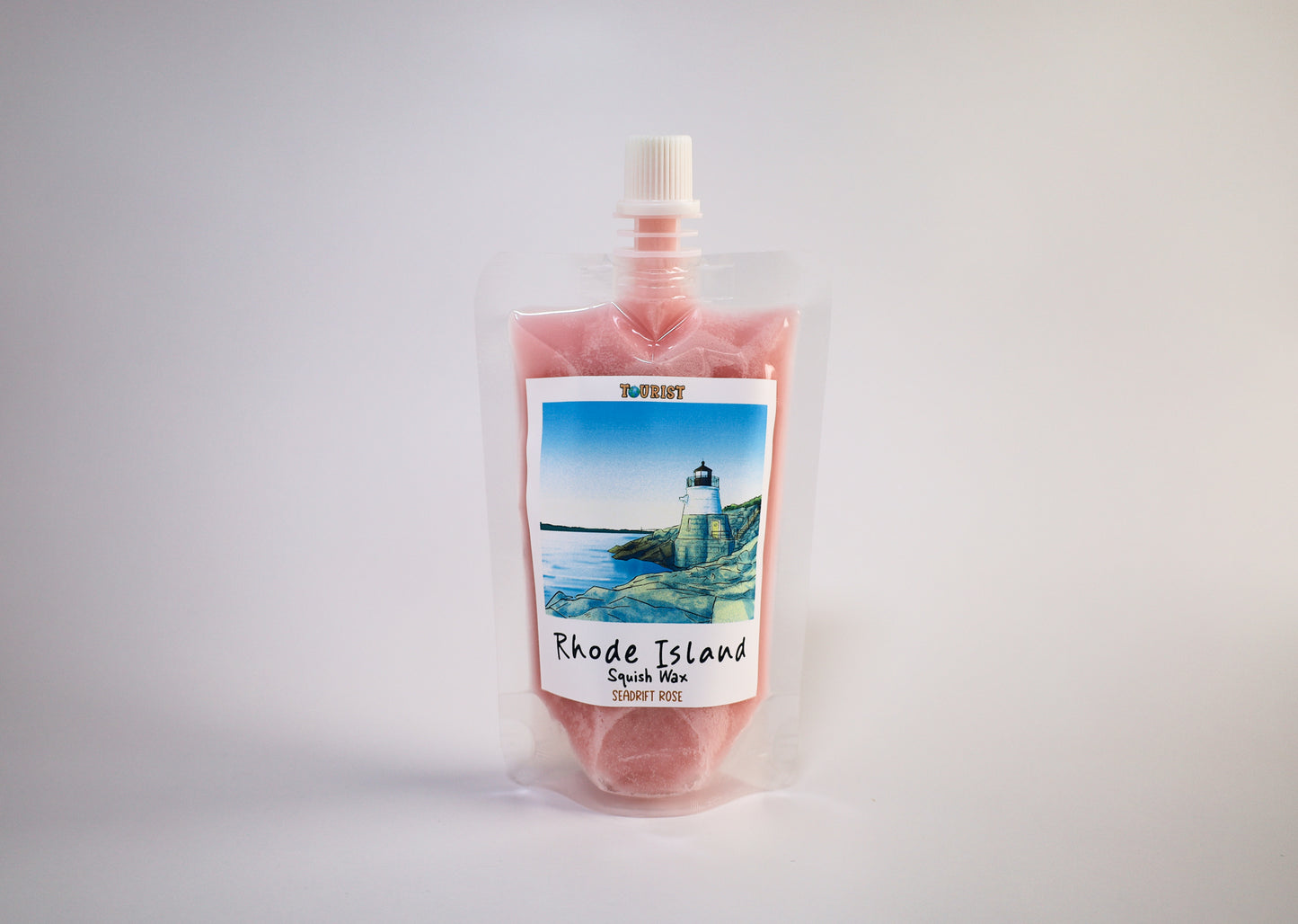 Pink squish wax package with Rhode Island label on a gray background