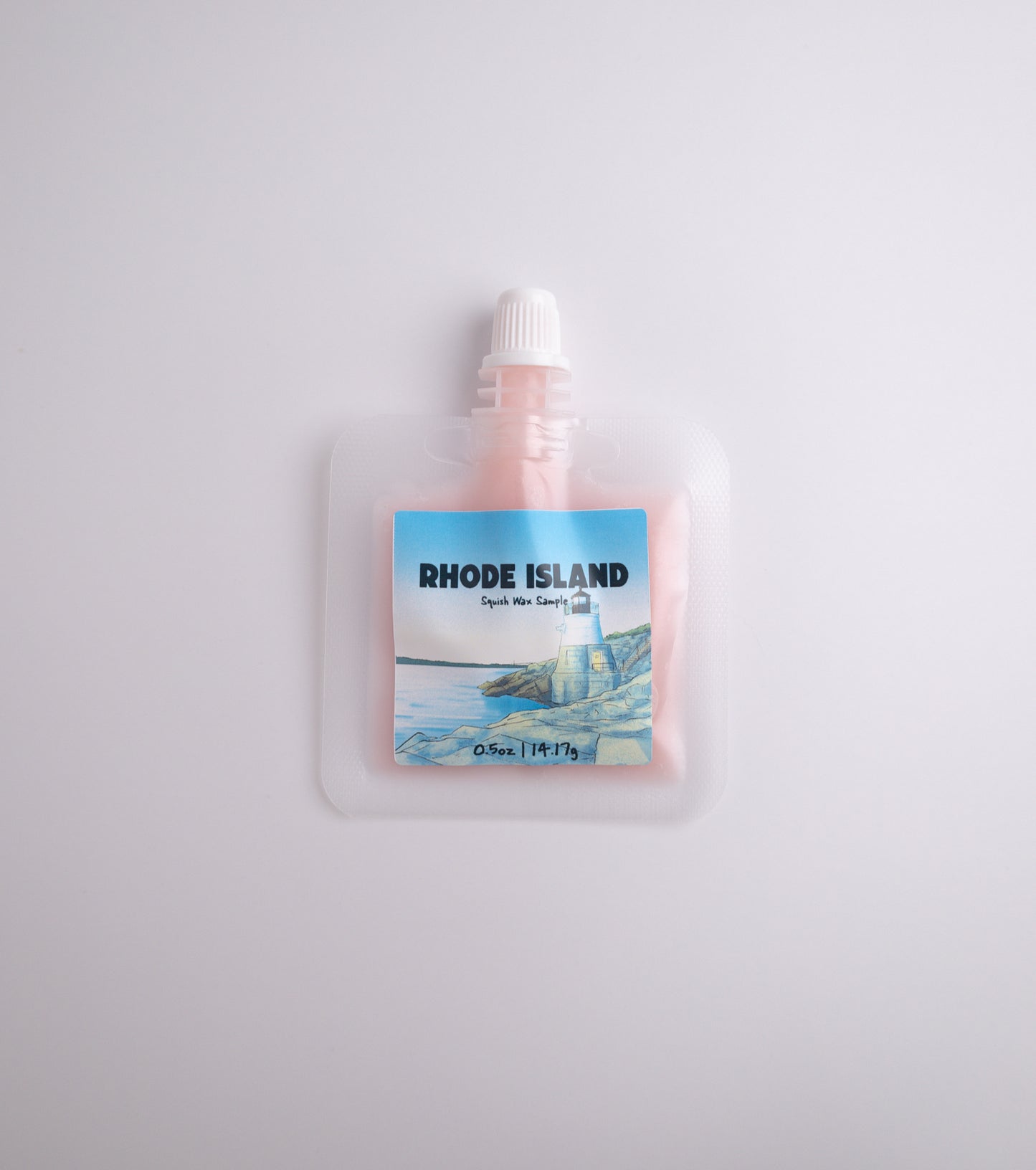 Small sample squish wax pouch with 'Rhode Island' label on a light gray background