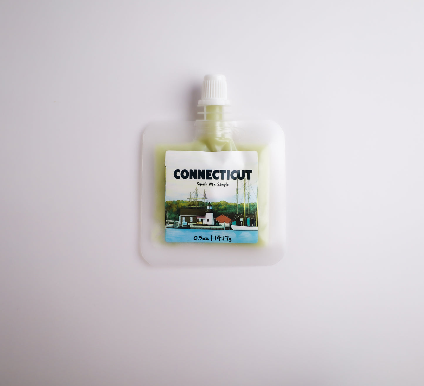 Small pouch with a Connecticut-themed label on a light gray background