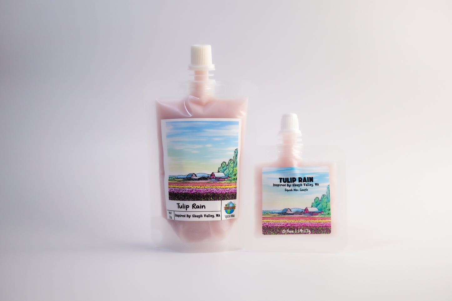 Pouch of cherry blossom-themed squeezable wax melts product with a scenic label on a white background