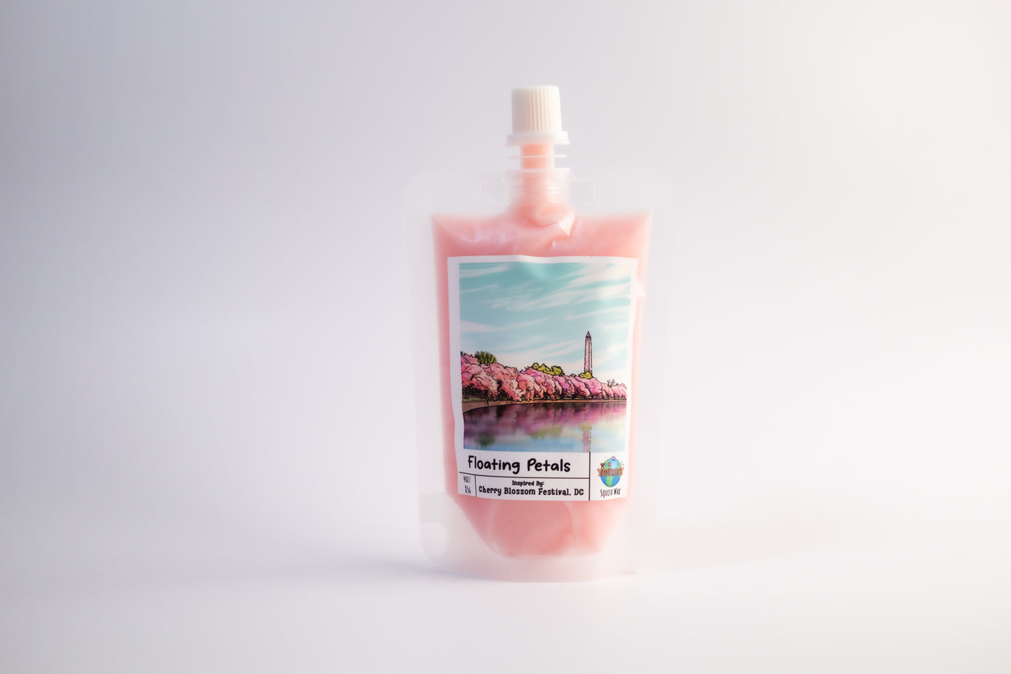 Pouch of cherry blossom-themed squeezable wax melt product with a scenic label on a white background