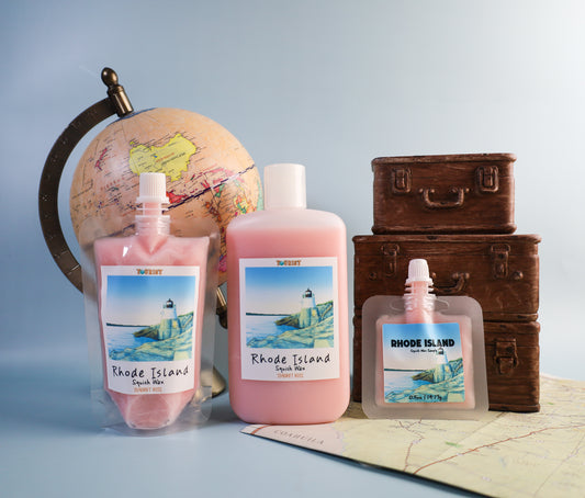 Three sizes of 'Rhode Island' themed squish wax products on a map with a globe and suitcases in the background.