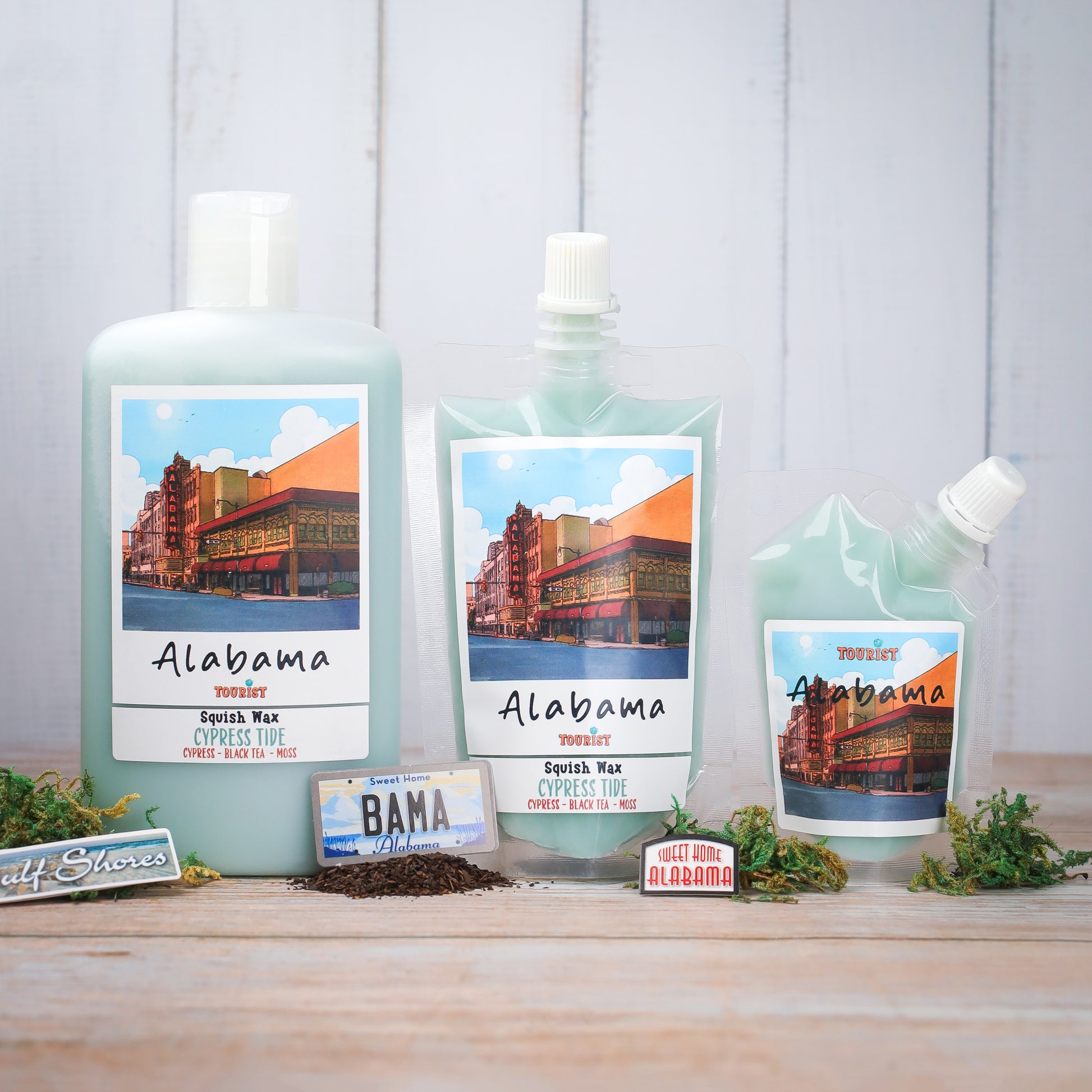 Alabama Squish Wax set featuring Cypress Tide scent, includes three sizes in sleek green packaging.
