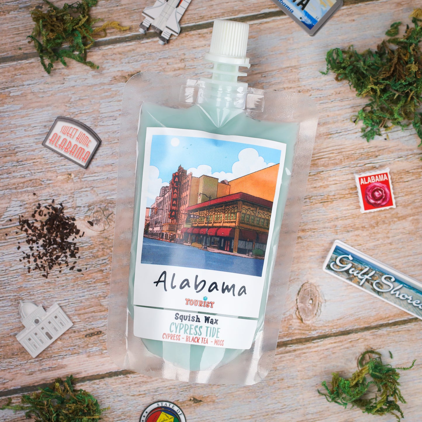 Alabama Squish Wax in Cypress Tide scent—cypress, black tea, and moss, packaged in a convenient pouch.