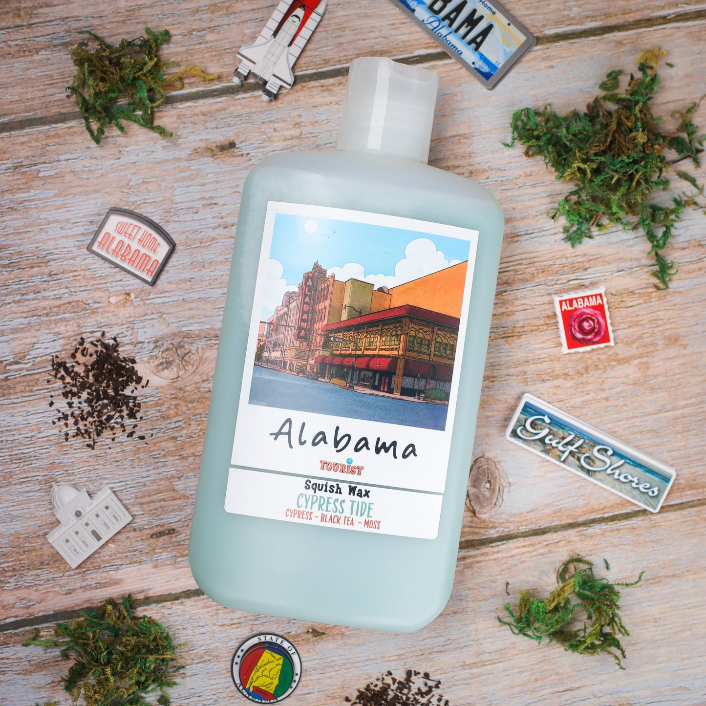 Alabama Squish Wax in Cypress Tide scent, featuring cypress, black tea, and moss, with a decorative label.