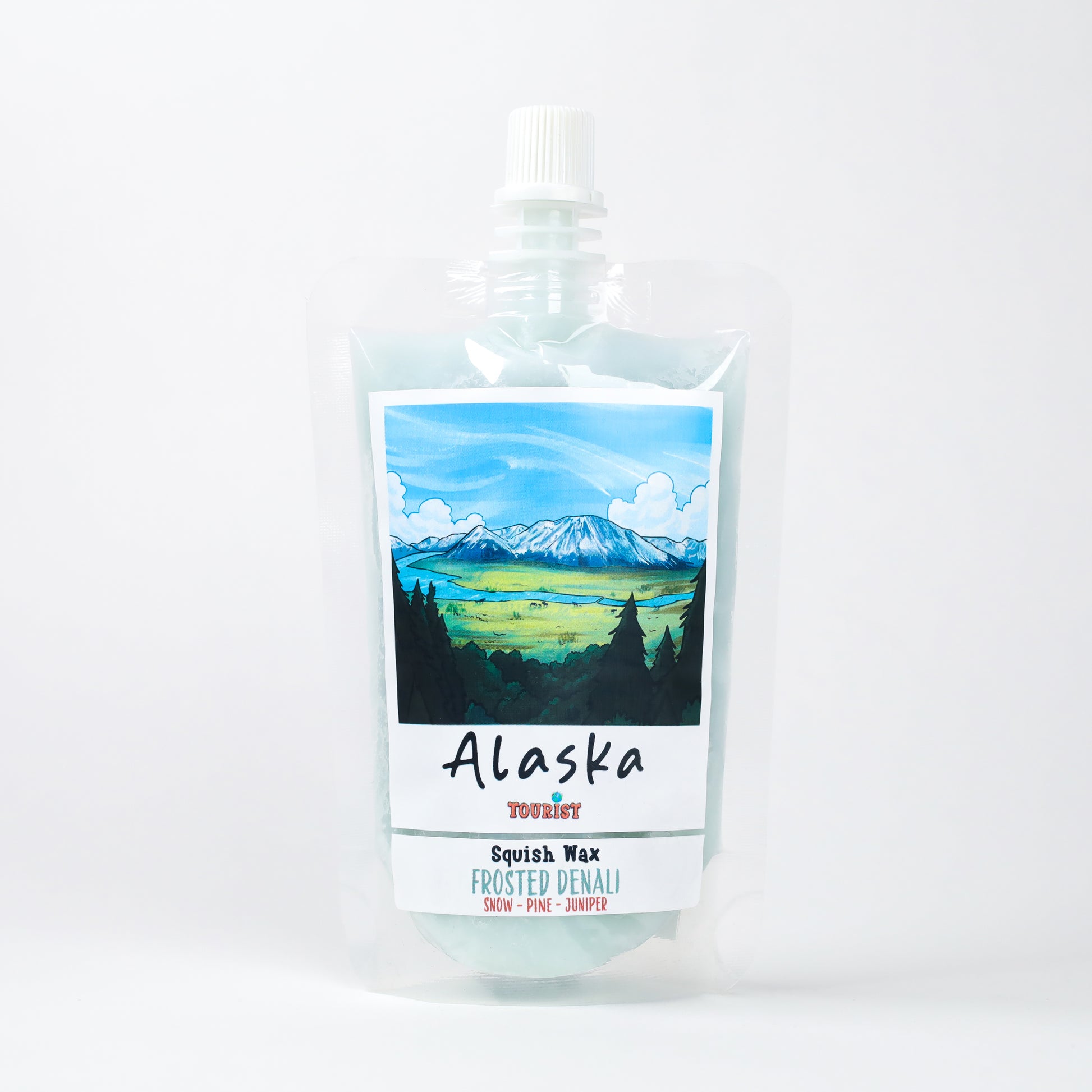 Squish Wax in Frosted Denali, featuring snow, pine, and juniper scents; packaged in a clear pouch.