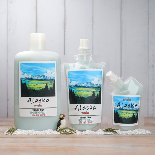 Alaska Squish Wax - Frosted Denali, pine-scented, features three sizes in frosted green packaging.