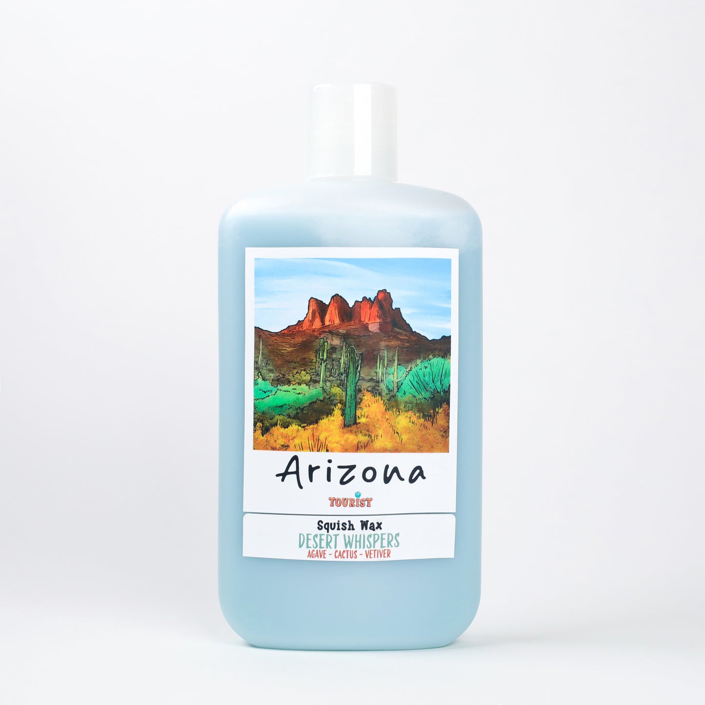 Squish Max lotion in blue bottle, scent 'Desert Whispers', featuring agave, cactus, and vetiver.