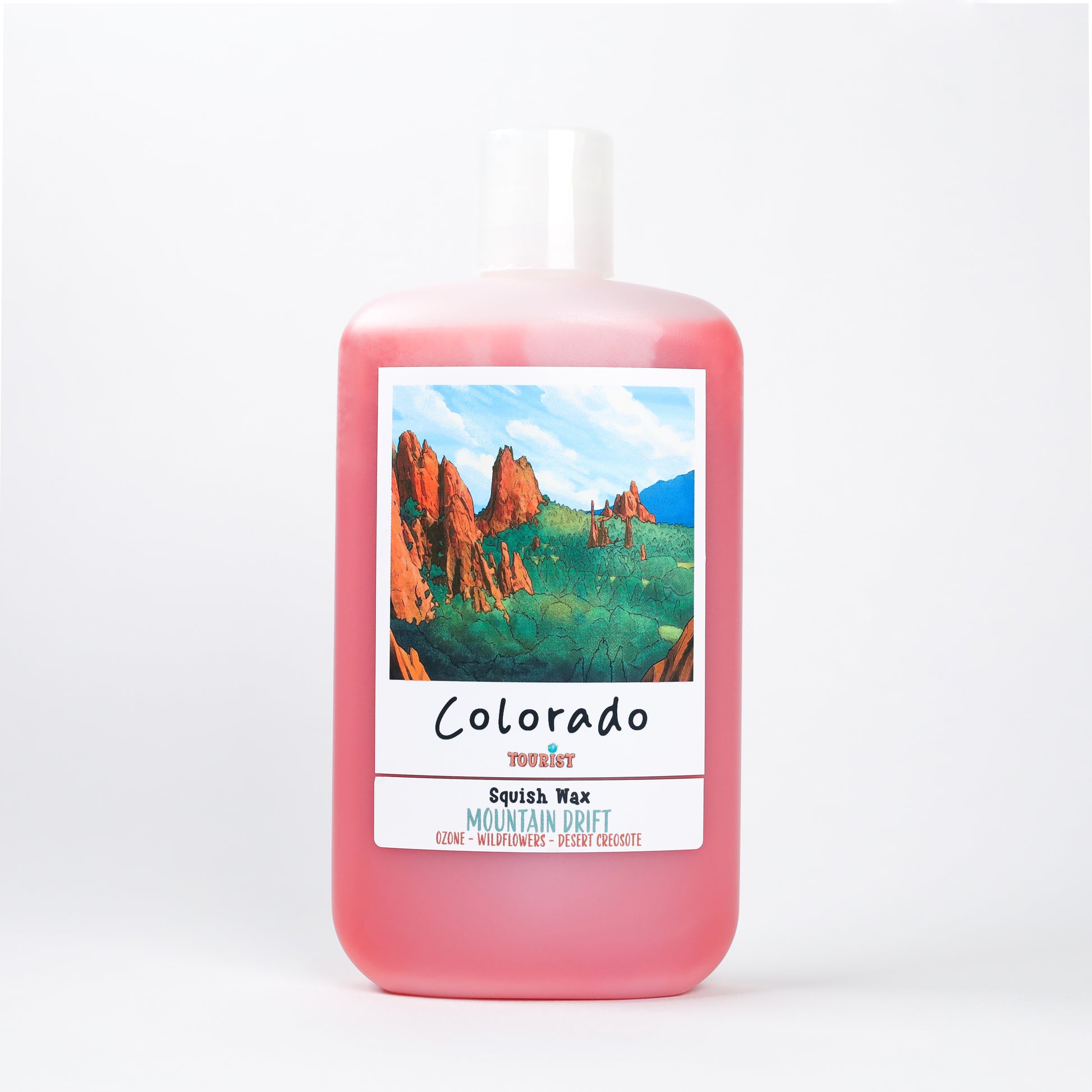 Colorado Squish Wax in pink, featuring Mountain Drift scent with notes of ozone and wildflowers.