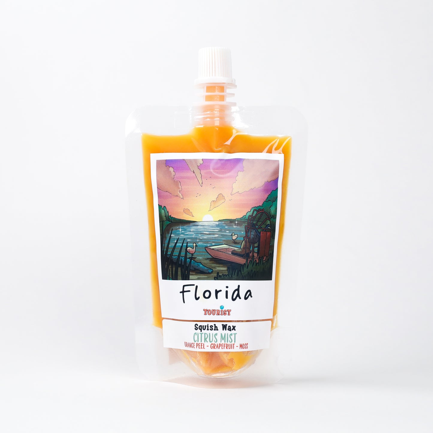 Florida Squish Wax Citrus Mist, orange color, infused with orange peel and grapefruit scents.