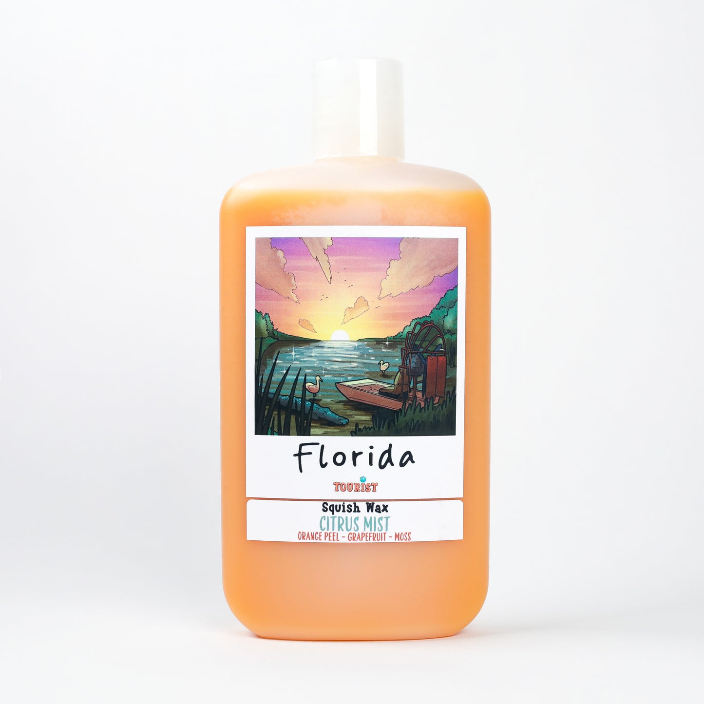 Florida Squish Wax in Citrus Mist with orange peel, grapefruit, and moss scents, 12 oz bottle.