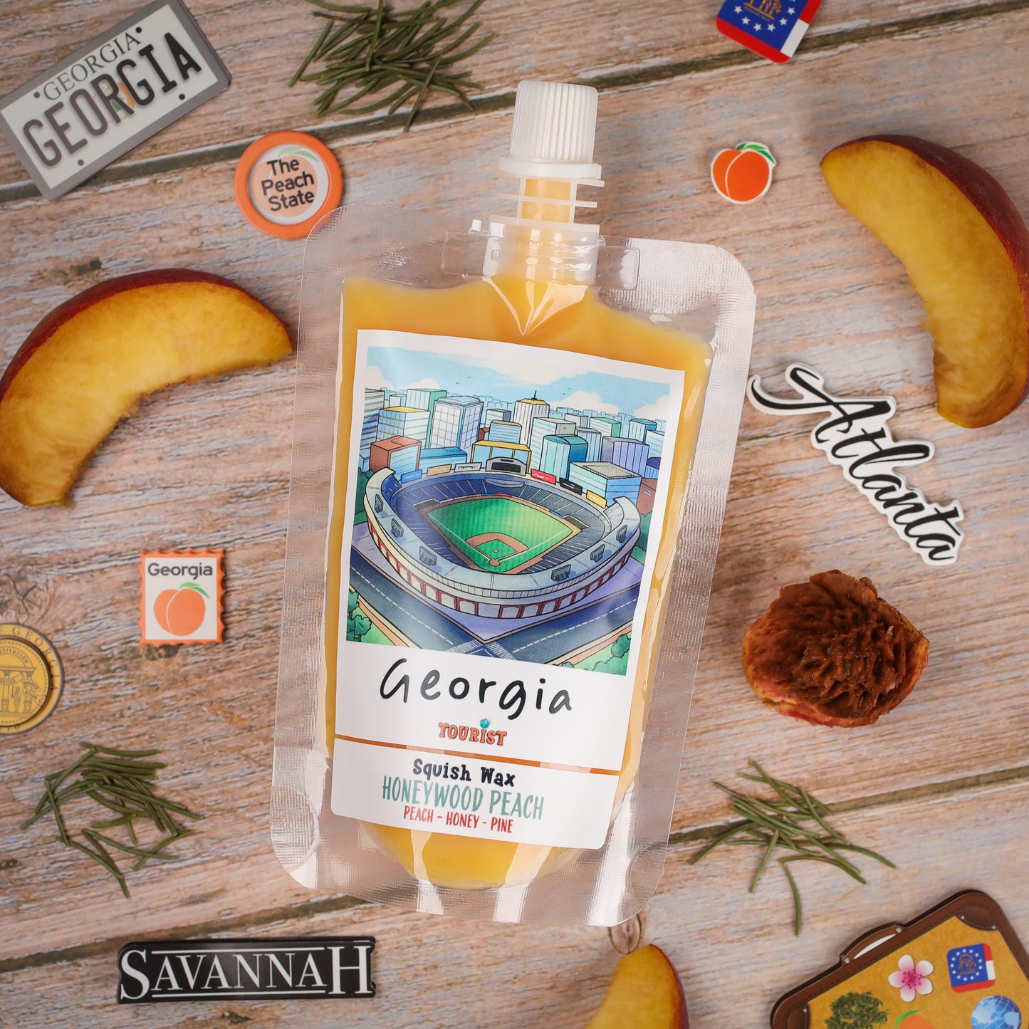 Squish Wax Honeywood Peach in pouch, featuring peach and pine scent, Georgia-themed design, Atlanta.