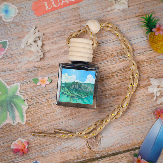 Handcrafted glass bottle with an ocean view print, featuring a wood and braided rope necklace.