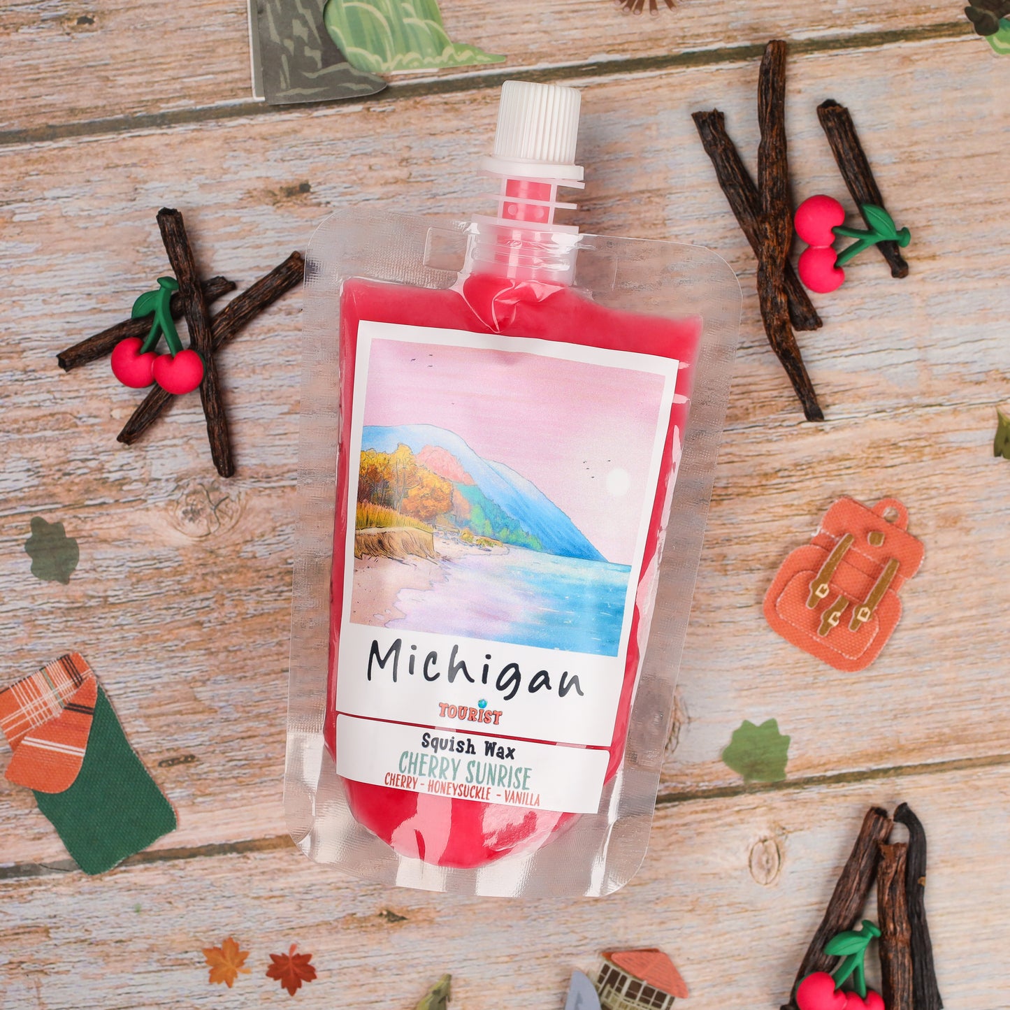 Michigan Squish Wax in Cherry Sunrise, vibrant red color, featuring cherry, honeysuckle, and vanilla scents.