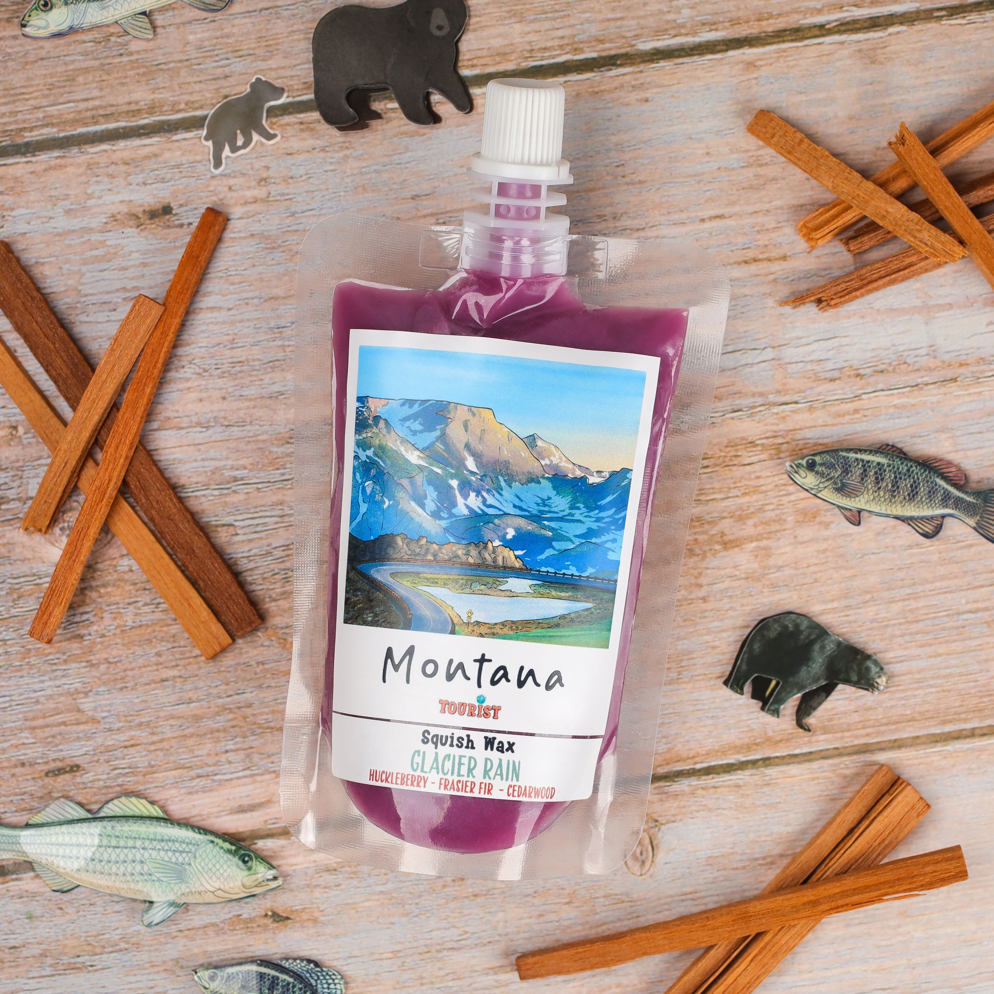 Montana Squish Wax in Glacier Rain scent, featuring huckleberry, frasier fir, and cedarwood flavors.