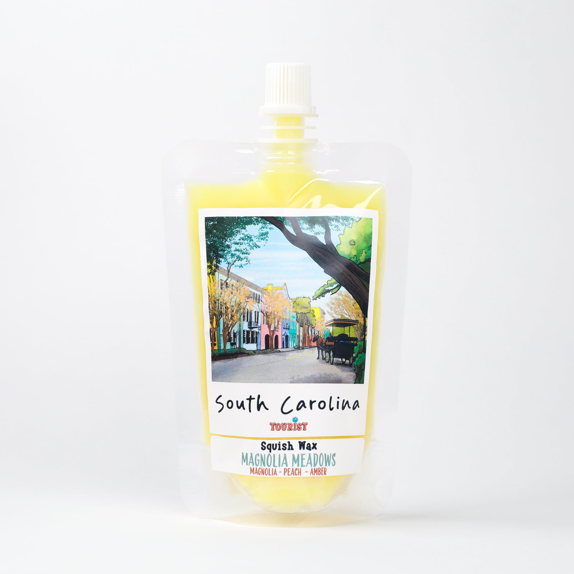 South Carolina Squish Wax in yellow pouch, featuring Magnolia Meadows scent with peach and amber notes.