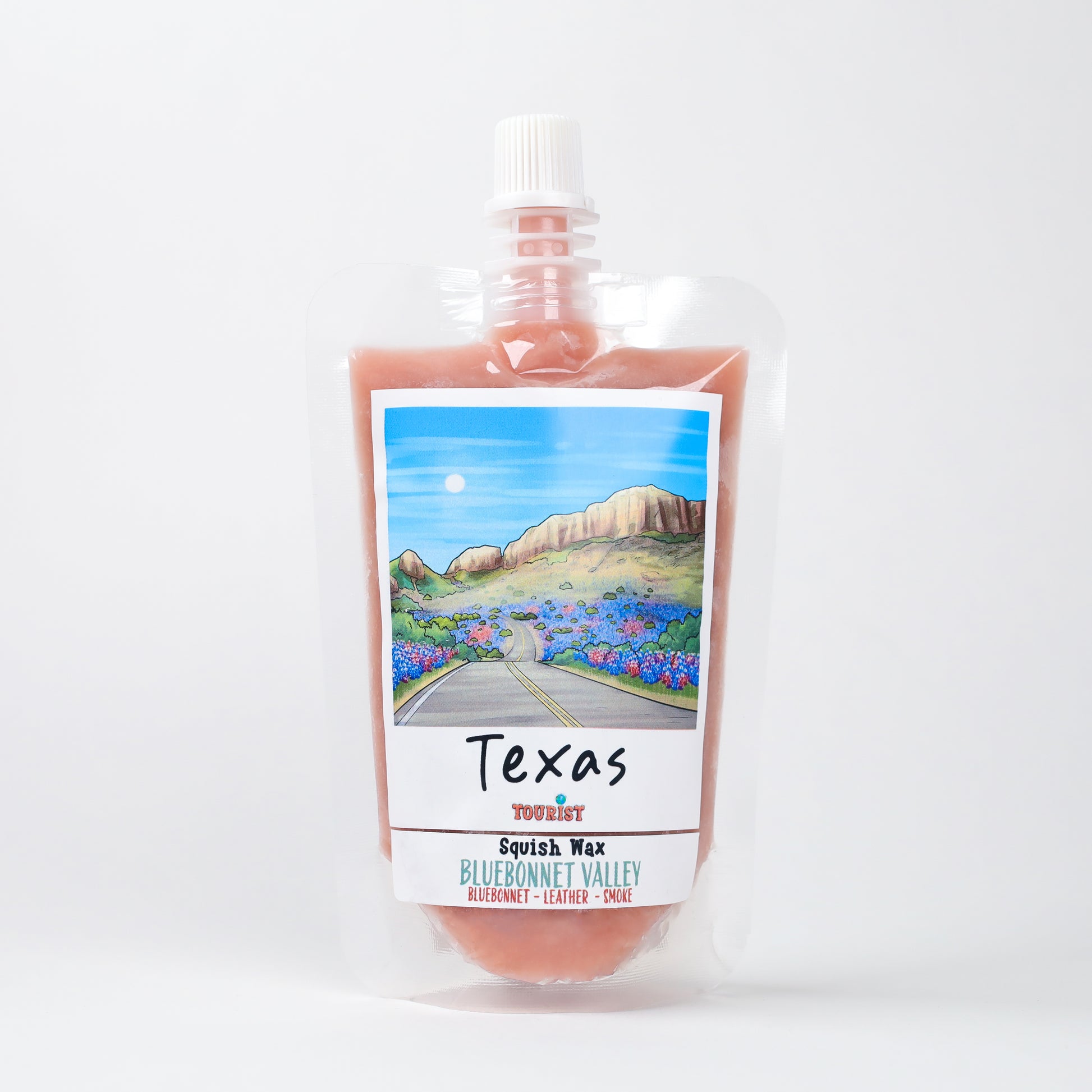 Texas Squish Wax in a pouch featuring Bluebonnet Valley scent, blending bluebonnet, leather, and smoke notes.